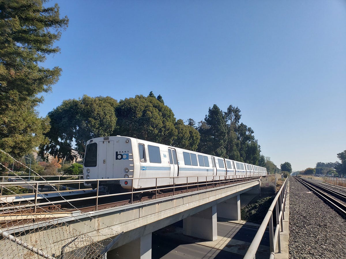 BART train travels on grade separated guideway