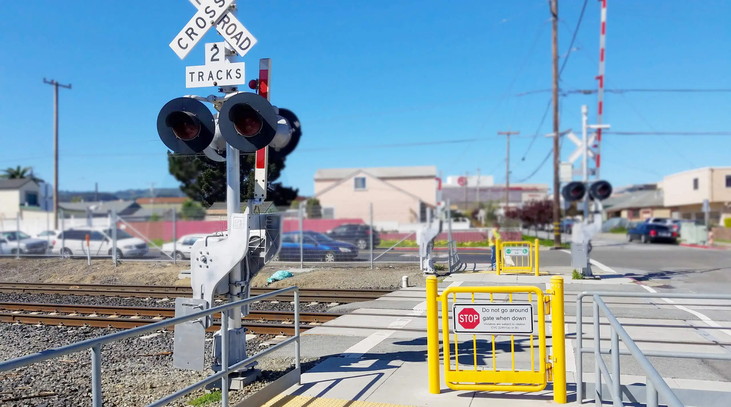 At-Grade crossing improvements with pedestrian gate and railroad crossing arms