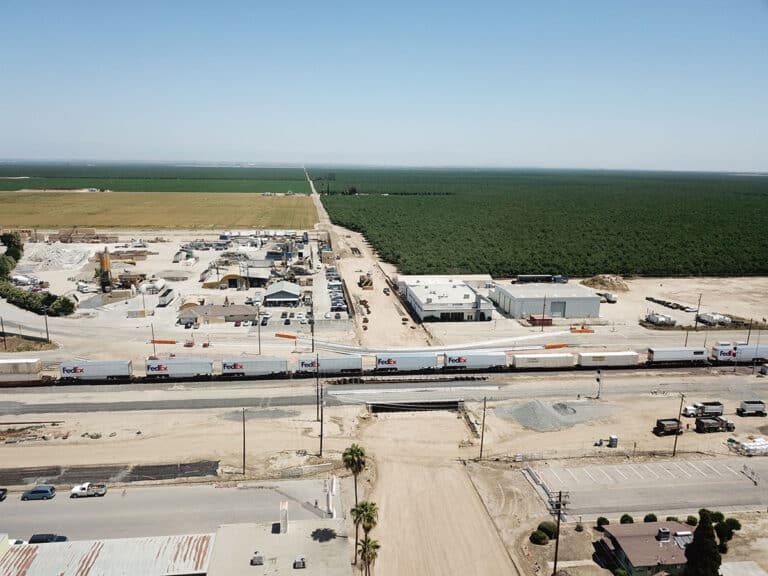 BNSF Railroad in operation on completed Poso Ave grade separation segment for the CA High-Speed Rail