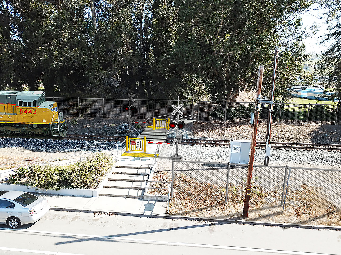 rendering of a pedestrian at-grade rail crossing