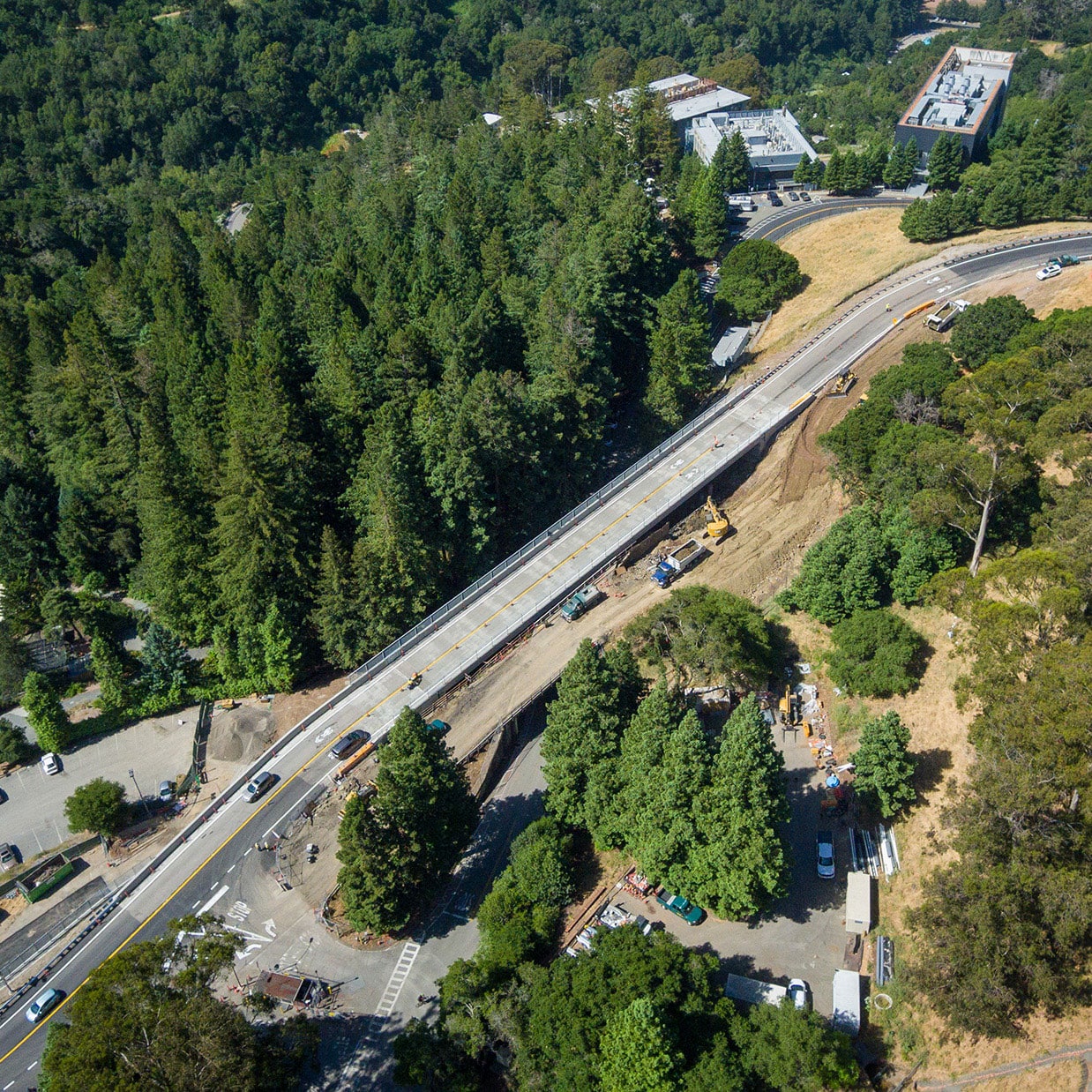 aerial image of the UCB centennial bridge with construction almost complete